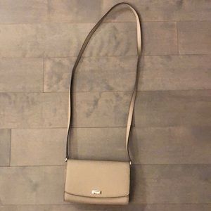 Gently used Kate Spade light purple purse! Like new except scratches on label